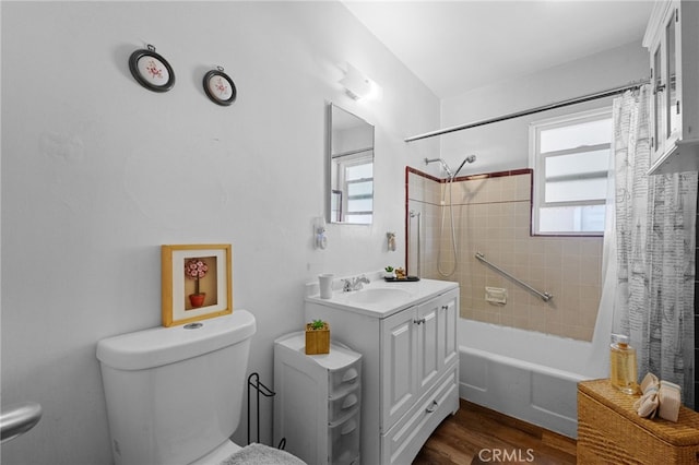 1980 N Sierra Way, San Bernardino, CA 92405 - full bath with plenty of natural light, toilet, shower / tub combo, and wood finished floors