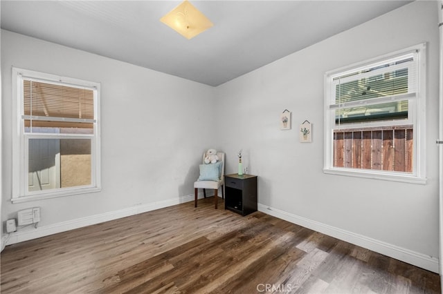 1980 N Sierra Way, San Bernardino, CA 92405 - spare room featuring wood finished floors and baseboards