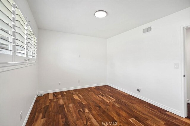 6028 Hart Ave, Temple City, CA 91780 - spare room with baseboards and wood finished floors