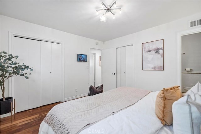 6028 Hart Ave, Temple City, CA 91780 - bedroom featuring multiple closets and dark wood finished floors