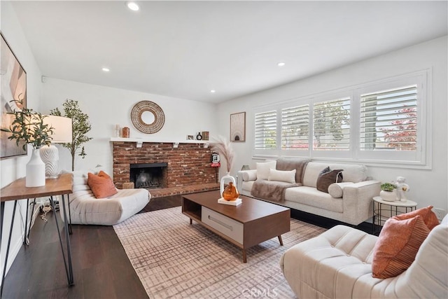 6028 Hart Ave, Temple City, CA 91780 - living area with wood finished floors, recessed lighting, and a brick fireplace