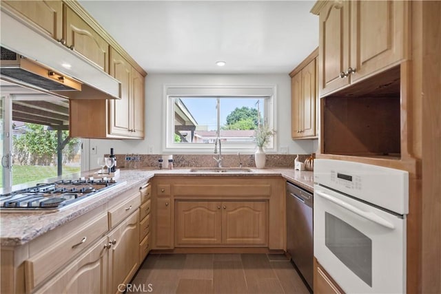 6028 Hart Ave, Temple City, CA 91780 - kitchen with appliances with stainless steel finishes, under cabinet range hood, a sink, plenty of natural light, and recessed lighting