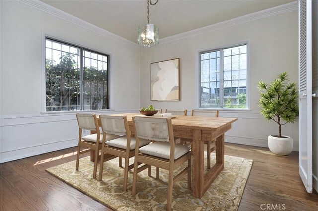 5625 Matilija Ave, Valley Glen, CA 91401 - dining space featuring ornamental molding, a chandelier, and wood finished floors