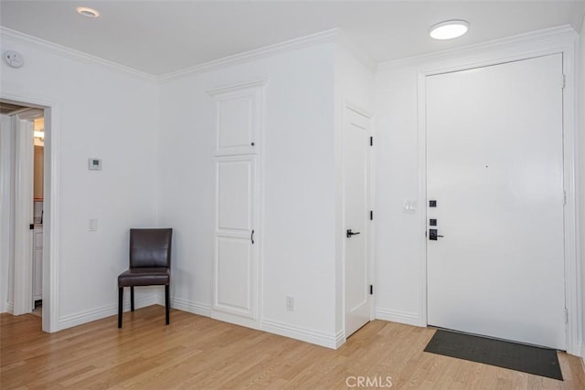 1115 S Elm Dr Unit 510, Los Angeles, CA 90035 - entrance foyer featuring light wood-style floors, baseboards, and crown molding