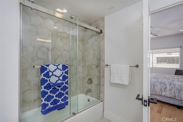 1115 S Elm Dr Unit 510, Los Angeles, CA 90035 - full bathroom with connected bathroom, combined bath / shower with glass door, wood finished floors, baseboards, and ceiling fan