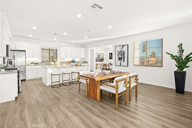 2639 Glamis Ct, Arcadia, CA 91007 - dining room with light wood-type flooring, recessed lighting, and baseboards