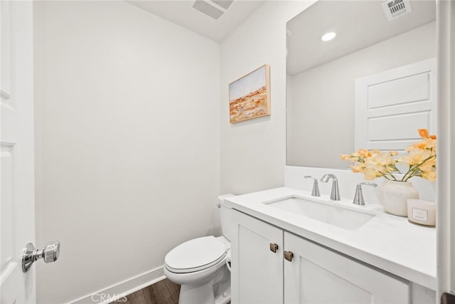 2639 Glamis Ct, Arcadia, CA 91007 - half bath with wood finished floors, baseboards, toilet, and vanity