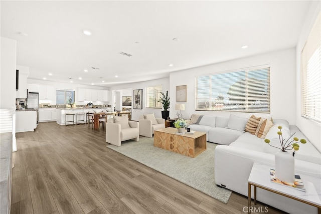 2639 Glamis Ct, Arcadia, CA 91007 - living area featuring light wood-style flooring, plenty of natural light, and recessed lighting