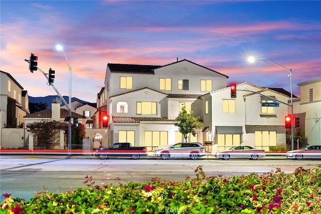 2639 Glamis Ct, Arcadia, CA 91007 - back of house at dusk featuring stucco siding and a tile roof