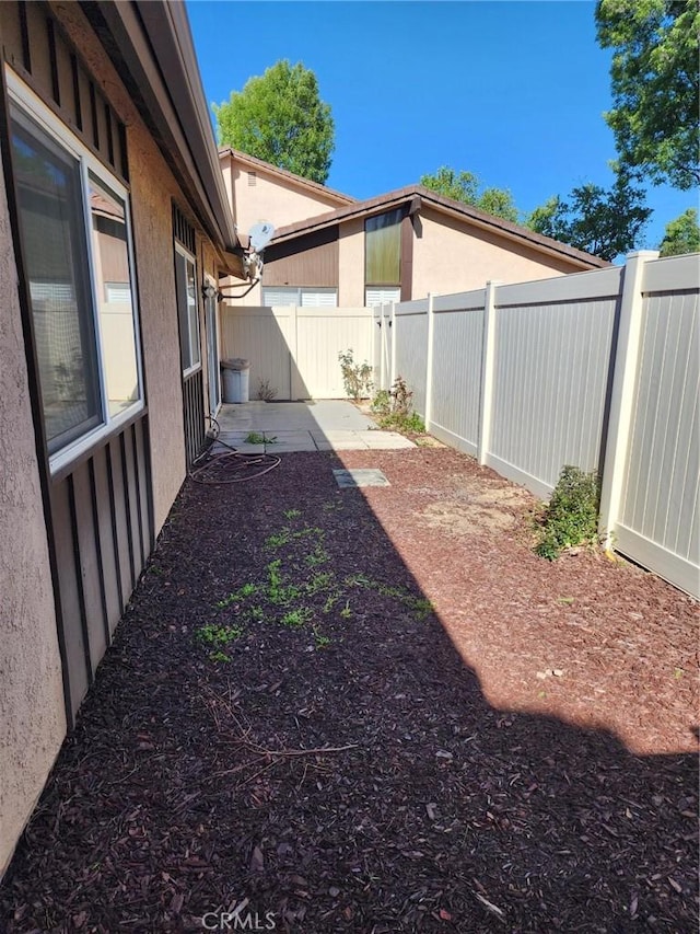 2120 Jacaranda Ct, San Bernardino, CA 92404 - fenced backyard featuring a patio
