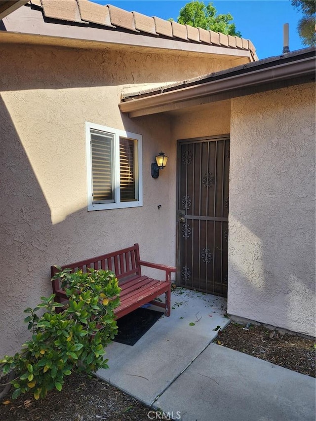 2120 Jacaranda Ct, San Bernardino, CA 92404 - property entrance featuring stucco siding