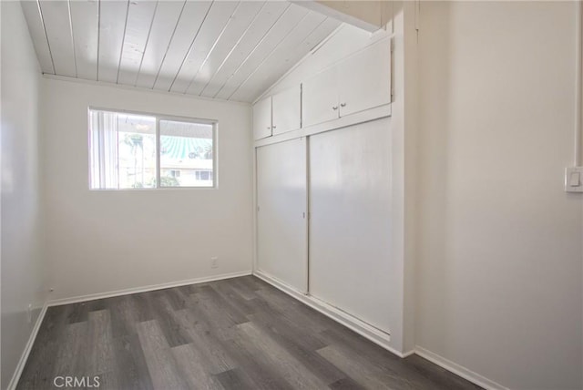 4040 Grand View Blvd Unit 41, Los Angeles, CA 90066 - unfurnished bedroom with dark wood-style flooring, a closet, and wooden ceiling
