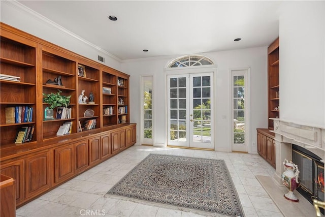 3211 E Mandeville Pl, Orange, CA 92867 - doorway to outside featuring french doors, a premium fireplace, and crown molding