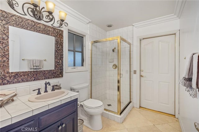 3211 E Mandeville Pl, Orange, CA 92867 - bathroom with a shower stall, toilet, vanity, tile patterned floors, and ornamental molding