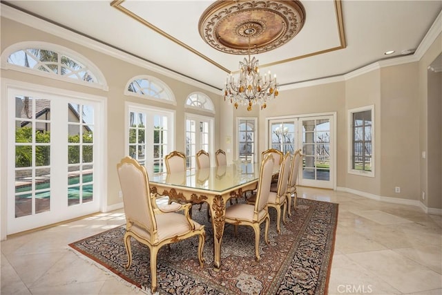 3211 E Mandeville Pl, Orange, CA 92867 - dining space featuring french doors, a raised ceiling, crown molding, baseboards, and a chandelier