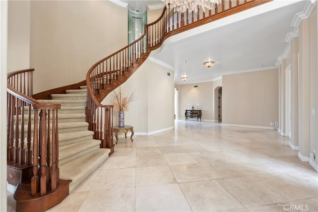 3211 E Mandeville Pl, Orange, CA 92867 - staircase featuring arched walkways, crown molding, baseboards, and a towering ceiling