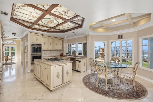 3211 E Mandeville Pl, Orange, CA 92867 - kitchen with coffered ceiling, cream cabinets, appliances with stainless steel finishes, baseboards, and healthy amount of natural light