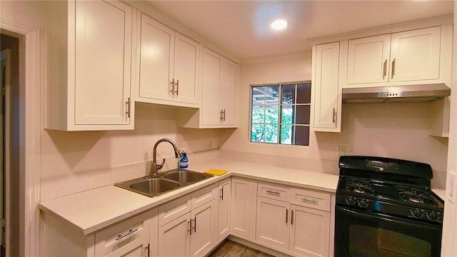 15134 Navilla Pl, Baldwin Park, CA 91706 - kitchen featuring gas stove, under cabinet range hood, a sink, white cabinetry, and light countertops