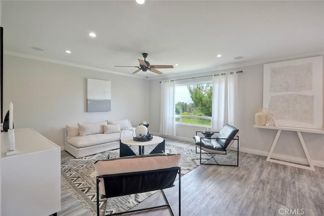 4273 Spoon Bill Way, Oceanside, CA 92057 - living area featuring recessed lighting, crown molding, ceiling fan, light wood finished floors, and baseboards