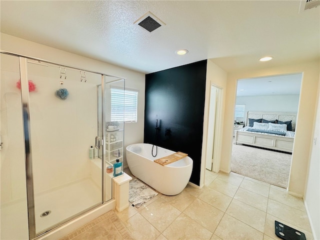 4772 Marrieta St, Jurupa Valley, CA 91752 - full bathroom featuring a soaking tub, a stall shower, ensuite bath, recessed lighting, and tile patterned floors