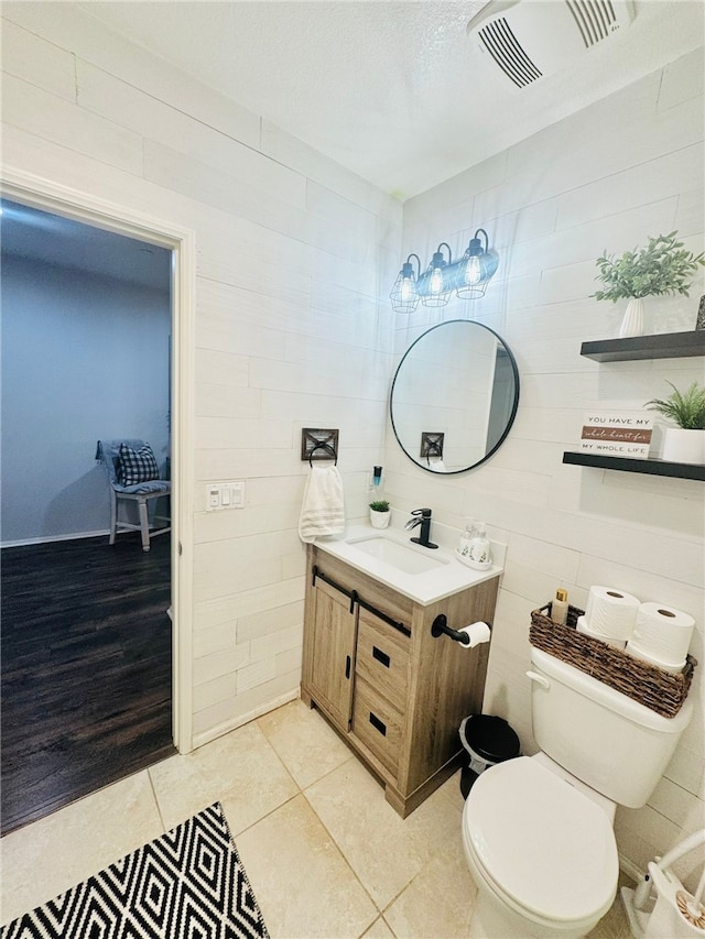 4772 Marrieta St, Jurupa Valley, CA 91752 - bathroom with toilet, vanity, and tile patterned flooring