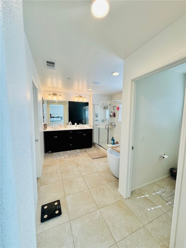 4772 Marrieta St, Jurupa Valley, CA 91752 - full bath featuring a shower stall, tile patterned flooring, vanity, and a soaking tub