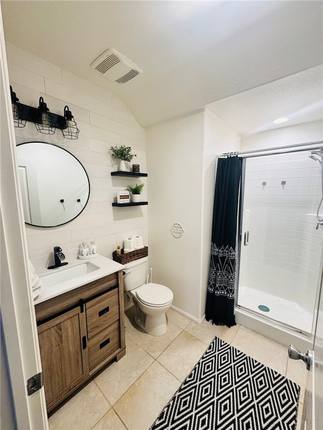 4772 Marrieta St, Jurupa Valley, CA 91752 - bathroom featuring a shower stall, toilet, vanity, and tile patterned flooring