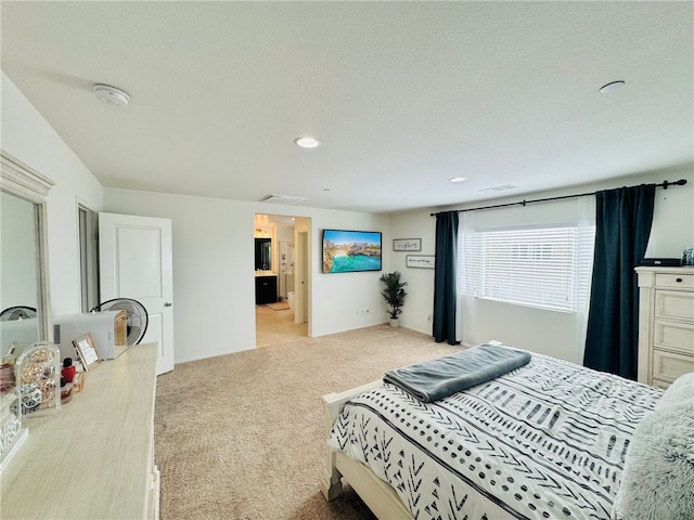 4772 Marrieta St, Jurupa Valley, CA 91752 - bedroom with light colored carpet, recessed lighting, and ensuite bathroom