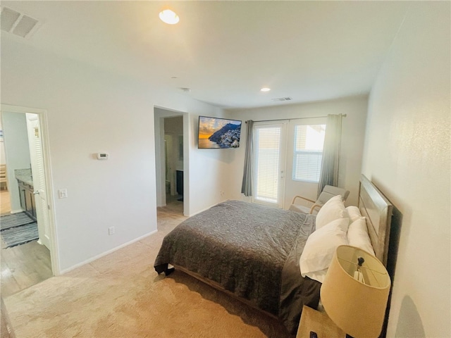 4772 Marrieta St, Jurupa Valley, CA 91752 - bedroom with light carpet, recessed lighting, baseboards, and connected bathroom