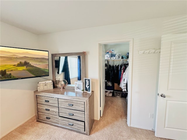 4772 Marrieta St, Jurupa Valley, CA 91752 - bedroom featuring light carpet, a spacious closet, a closet, and baseboards