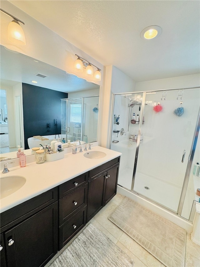 4772 Marrieta St, Jurupa Valley, CA 91752 - bathroom featuring a stall shower, tile patterned floors, and double vanity