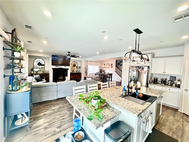4772 Marrieta St, Jurupa Valley, CA 91752 - kitchen featuring a sink, a ceiling fan, stainless steel fridge, white cabinets, and recessed lighting