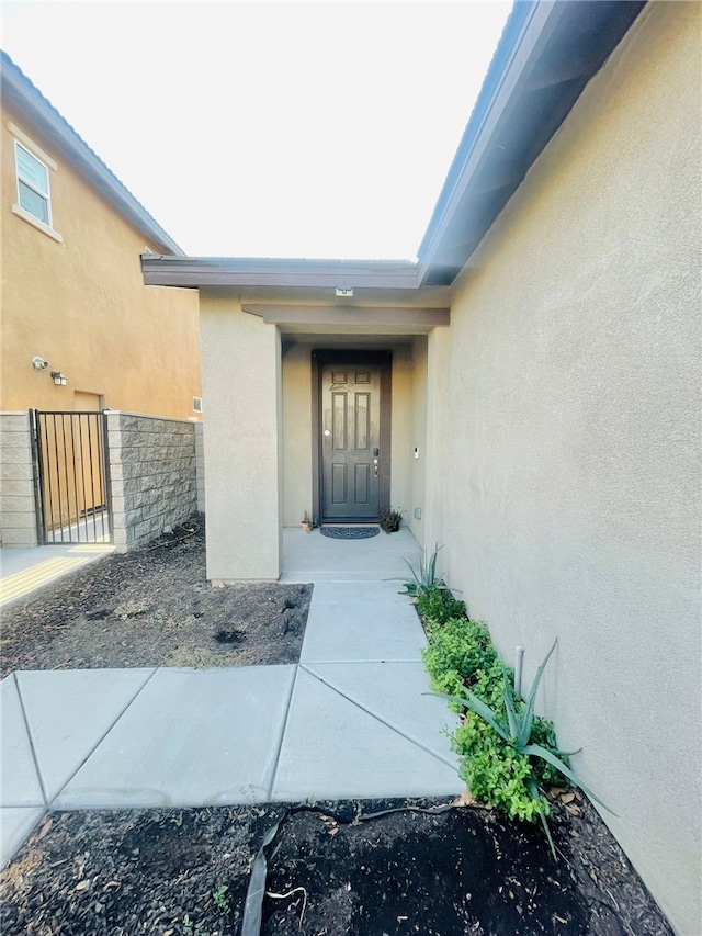 4772 Marrieta St, Jurupa Valley, CA 91752 - doorway to property featuring stucco siding