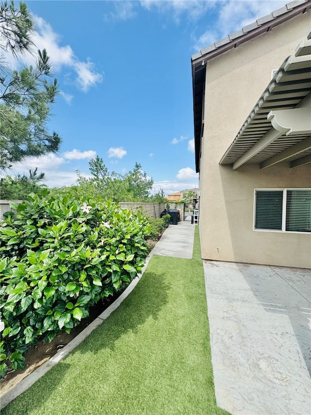 4772 Marrieta St, Jurupa Valley, CA 91752 - view of green lawn with a patio area