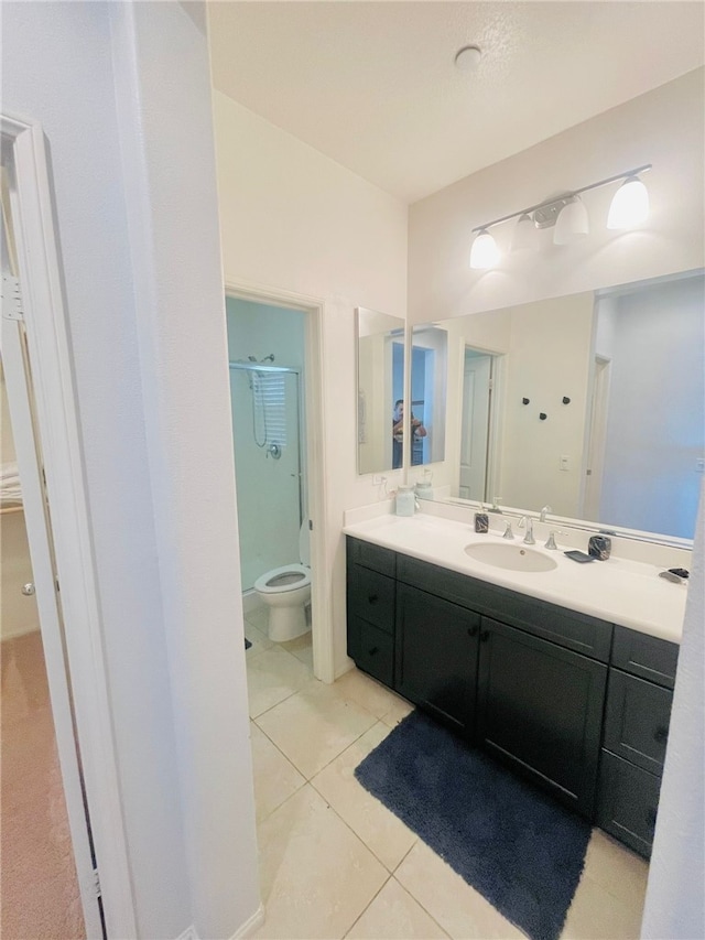 4772 Marrieta St, Jurupa Valley, CA 91752 - full bathroom featuring a stall shower, vanity, toilet, and tile patterned flooring