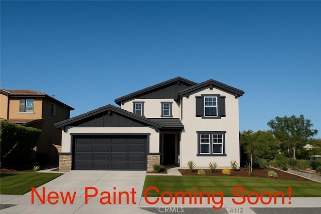 4772 Marrieta St, Jurupa Valley, CA 91752 - view of front of house featuring driveway, a front lawn, board and batten siding, and an attached garage