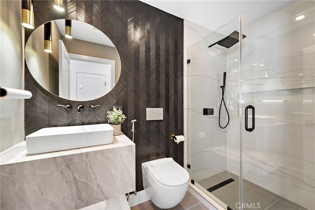 11 Bayside, Irvine, CA 92614 - bathroom with a stall shower, a sink, toilet, and tile walls