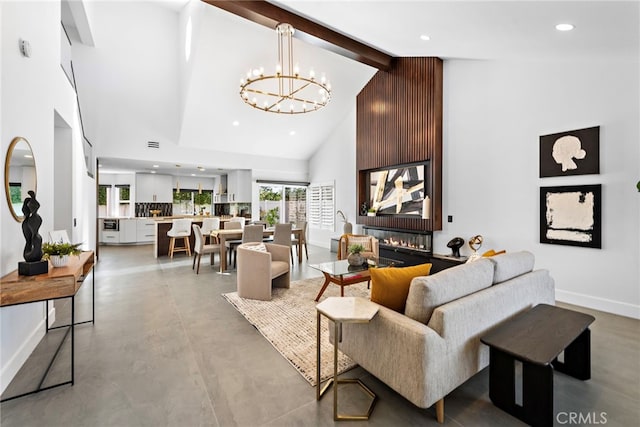 11 Bayside, Irvine, CA 92614 - living area featuring high vaulted ceiling, a chandelier, beamed ceiling, finished concrete flooring, and baseboards