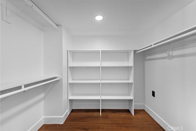 11 Bayside, Irvine, CA 92614 - walk in closet featuring wood finished floors
