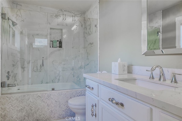 948 Peninsula Ave, Claremont, CA 91711 - bathroom with toilet, vanity, and shower / bath combination with glass door