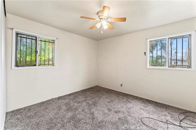 4303 Kansas Ave, Riverside, CA 92507 - carpeted empty room featuring healthy amount of natural light and a ceiling fan