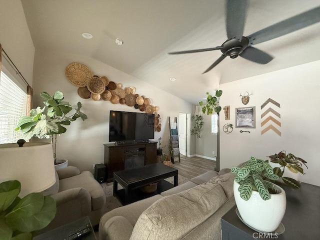 17857 Main St, Hesperia, CA 92345 - living area featuring wood finished floors, ceiling fan, vaulted ceiling, and baseboards