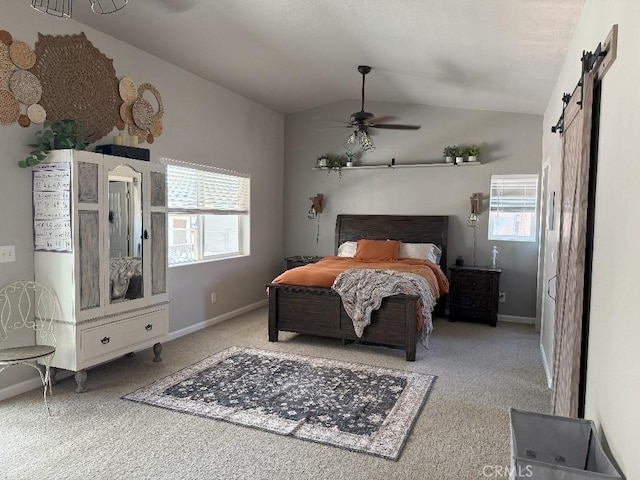 17857 Main St, Hesperia, CA 92345 - carpeted bedroom featuring a barn door, vaulted ceiling, and baseboards