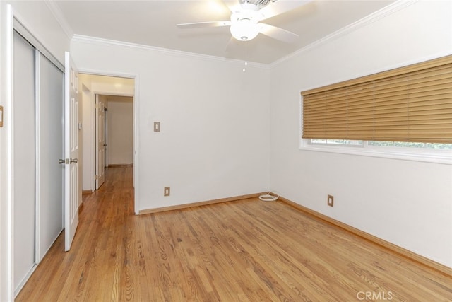835 N Lincoln St, Burbank, CA 91506 - unfurnished bedroom featuring light wood-type flooring, crown molding, baseboards, a closet, and a ceiling fan