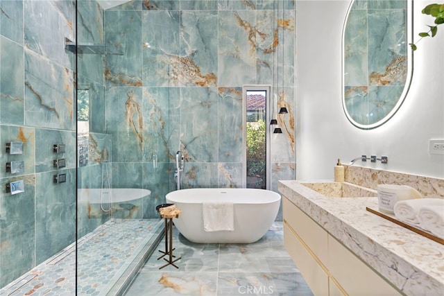 1318 Outrigger Dr, Corona Del Mar, CA 92625 - full bath featuring a freestanding tub, marble tiled flooring, vanity, a walk in shower, and tile walls