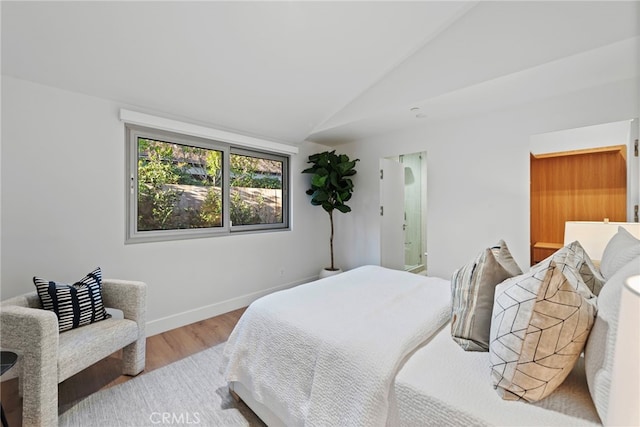 1318 Outrigger Dr, Corona Del Mar, CA 92625 - bedroom featuring wood finished floors, vaulted ceiling, and baseboards