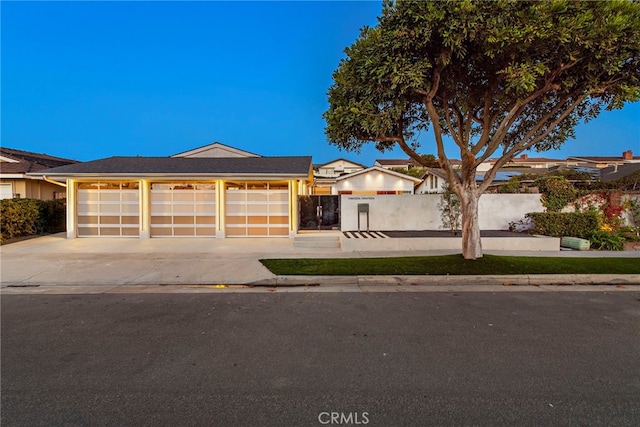 1318 Outrigger Dr, Corona Del Mar, CA 92625 - single story home with a garage, a fenced front yard, and concrete driveway