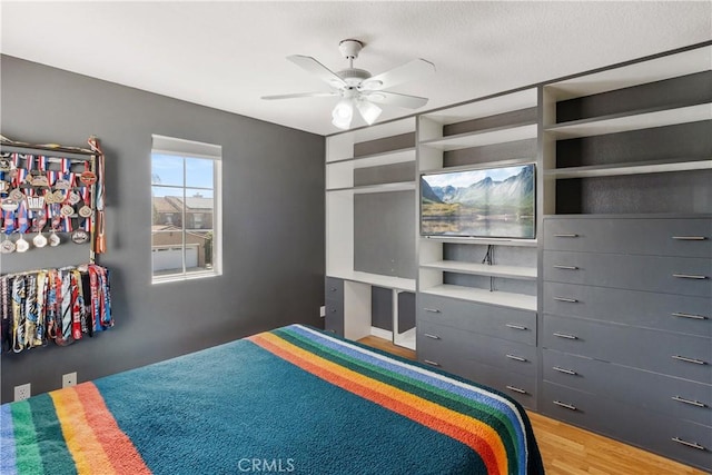 7311 Pinewood Ct, Eastvale, CA 92880 - bedroom with light wood-type flooring and ceiling fan