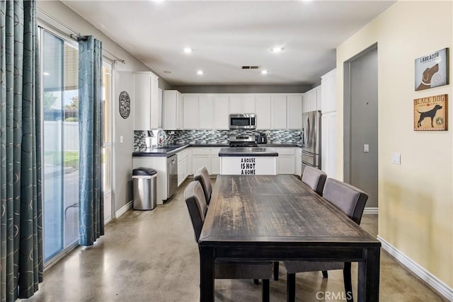 7311 Pinewood Ct, Eastvale, CA 92880 - dining space featuring concrete floors, baseboards, and recessed lighting