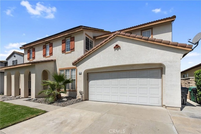 7311 Pinewood Ct, Eastvale, CA 92880 - mediterranean / spanish house with driveway, an attached garage, stucco siding, and a tiled roof